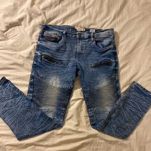 Jeanius Skinny Blue Jeans with Distressed Knee Details